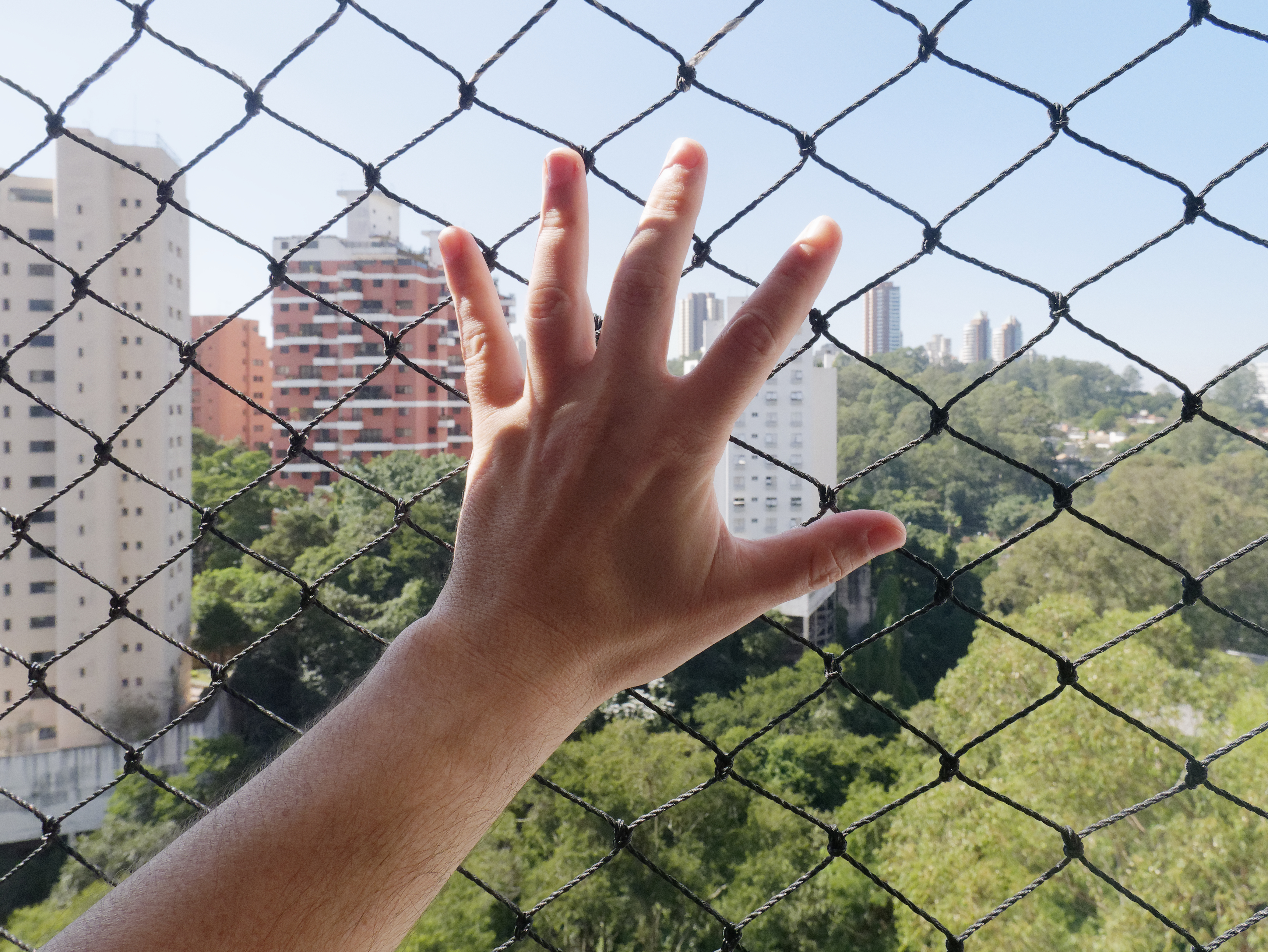 Detalhe do material de alta resistência da rede de proteção